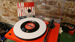 I Am Woman 7" vinyl single, with Exodus b-side.